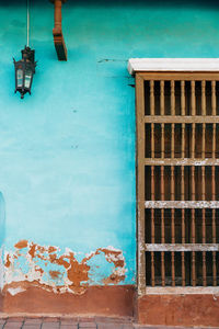 Lantern hanging against wall