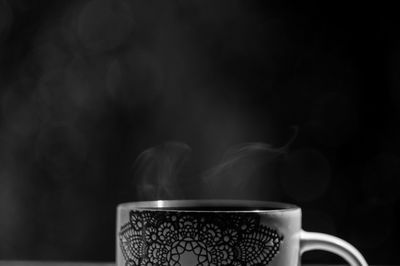 Close-up of coffee cup on table