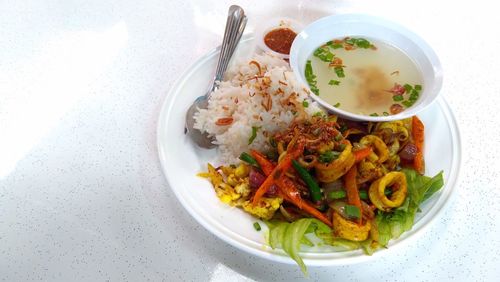 High angle view of meal served on table