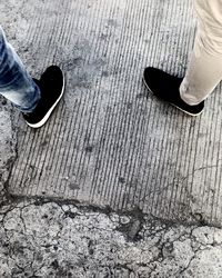 Low section of people standing on floor