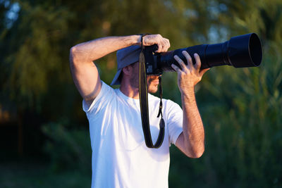 Midsection of man photographing