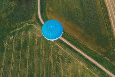 High angle view of plant on field
flying in a blue hot air balloon over the fields of belarus