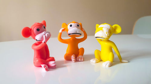 Close-up of yellow toys on table