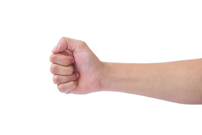 Close-up of human hand against white background