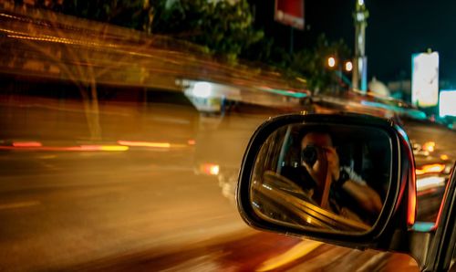 Light trails on road at night