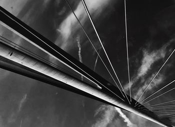 Low angle view of cables against sky