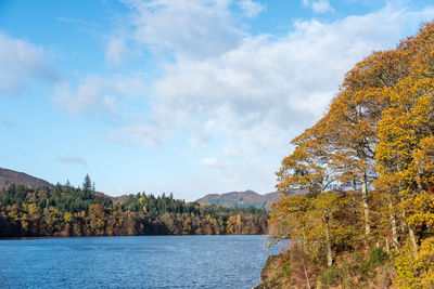 Scenic view of lake against sky during autumn