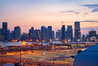 Cityscape against sky during sunset