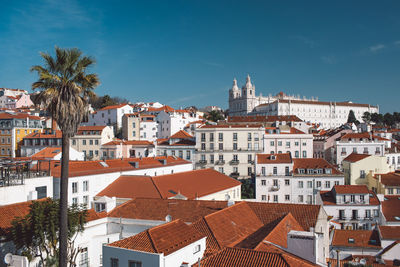 Buildings in city against sky