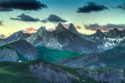 Scenic view of snowcapped mountains against sky