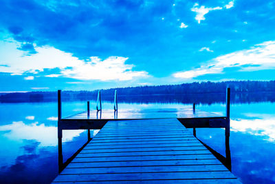 Empty pier over calm lake