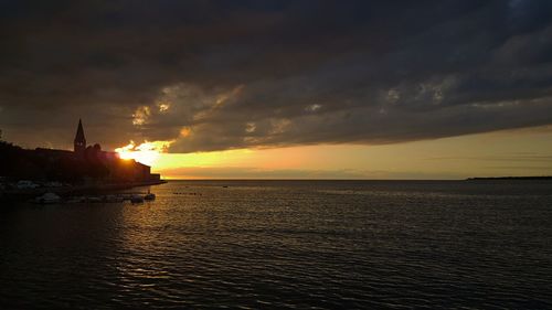 Scenic view of sea at sunset