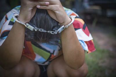 Close up. hands are handcuffed. captured prisoner or terrorist, close-up of hands in handcuffs.