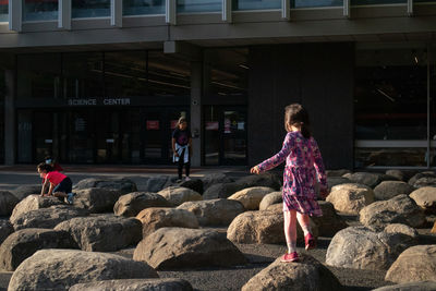 People standing on rock