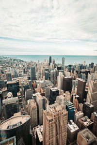 High angle view of buildings in city against sky