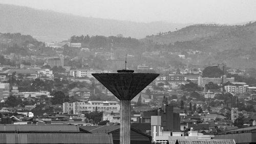 Buildings in city against sky