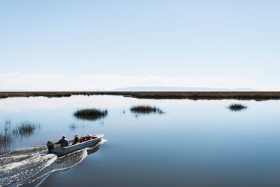 Scenic view of lake against clear sky