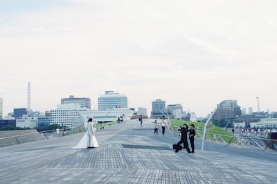 Full length of woman standing in city