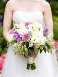 Close-up of woman holding bouquet
