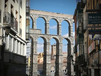 Low angle view of buildings against sky