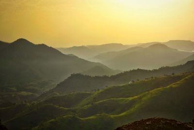 Scenic view of mountains at sunset