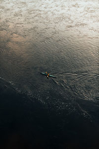 High angle view of man surfing in sea