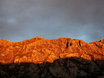 Scenic view of rock formations against sky