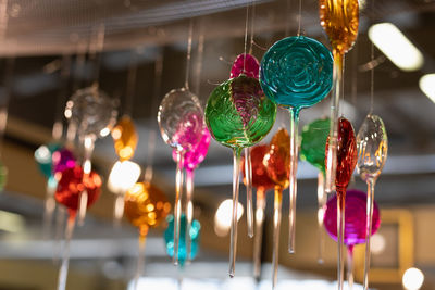 Round glass decorations in the shape of colored lollipops 