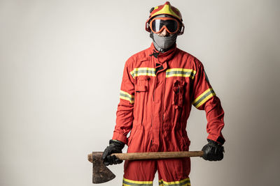 Full length of man standing against white background