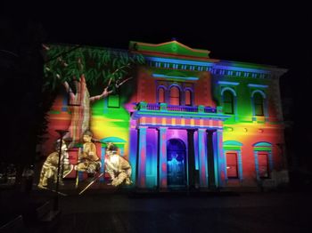 Illuminated building at night