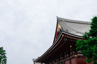 Low angle view of temple building against sky