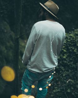 Rear view of man standing outdoors