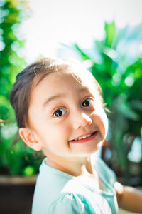 Close-up portrait of smiling girl