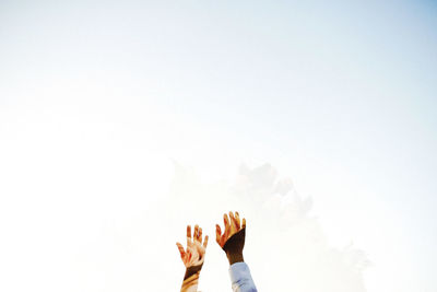 Wedding couple hands on the sky background. high quality photo