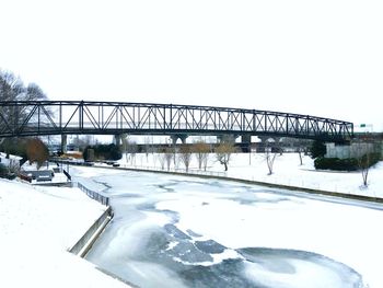 Bridge against clear sky during winter