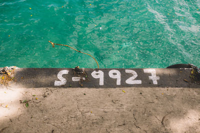 High angle view of numbers on pier