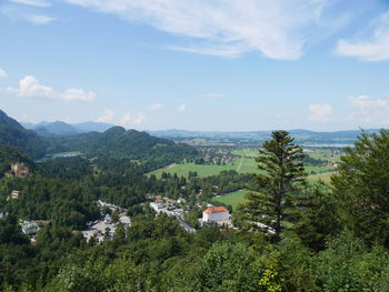 High angle view of trees and buildings against sky