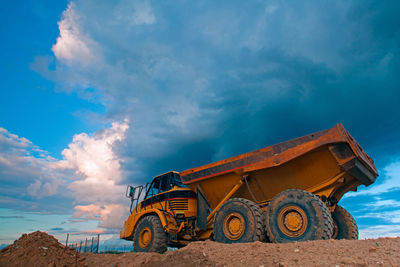 Low angle view of construction site against sky