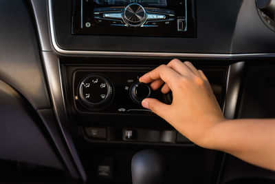 Cropped image of person in car