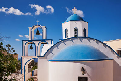 Saint anthony church - blue dome and bell tower - pyrgos village, santorini island, greece