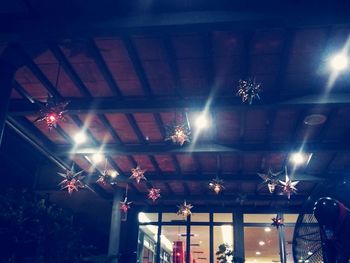 Low angle view of illuminated ceiling