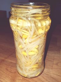 Close-up of glass of jar on table