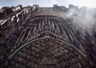 Low angle view of old building against sky