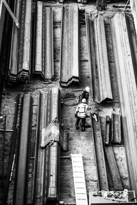 Low angle view of man working at construction site