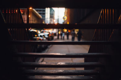 People in illuminated room