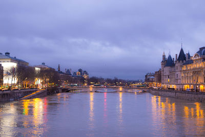 River with city in background at night