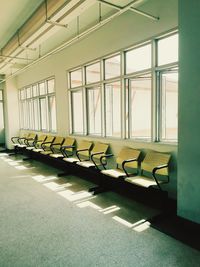 Empty chairs in corridor