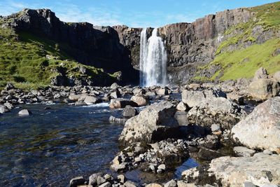 View of waterfall against sky