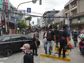 People walking on city street