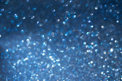 Defocused image of illuminated lights at night
